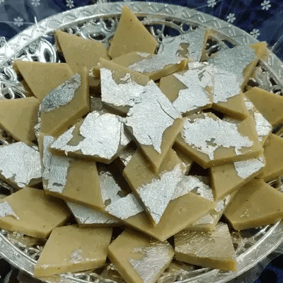 Premium Kaju Katli — silver-leaf cashew diamonds from our Khammam kitchen